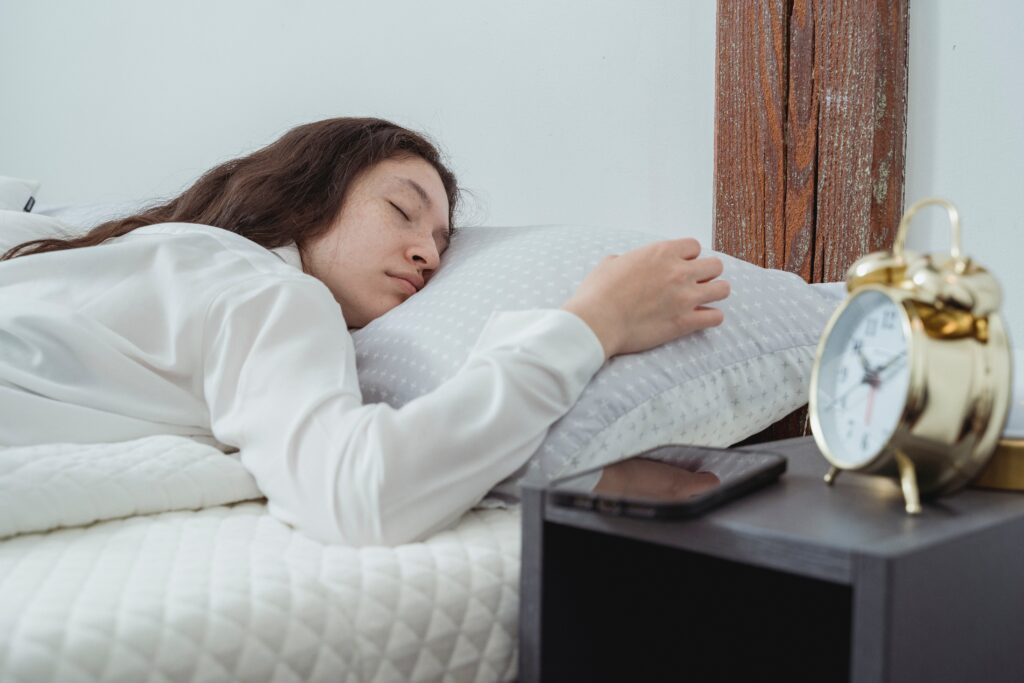 person sleeping with phone